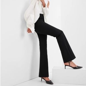 stretchy black flare trousers